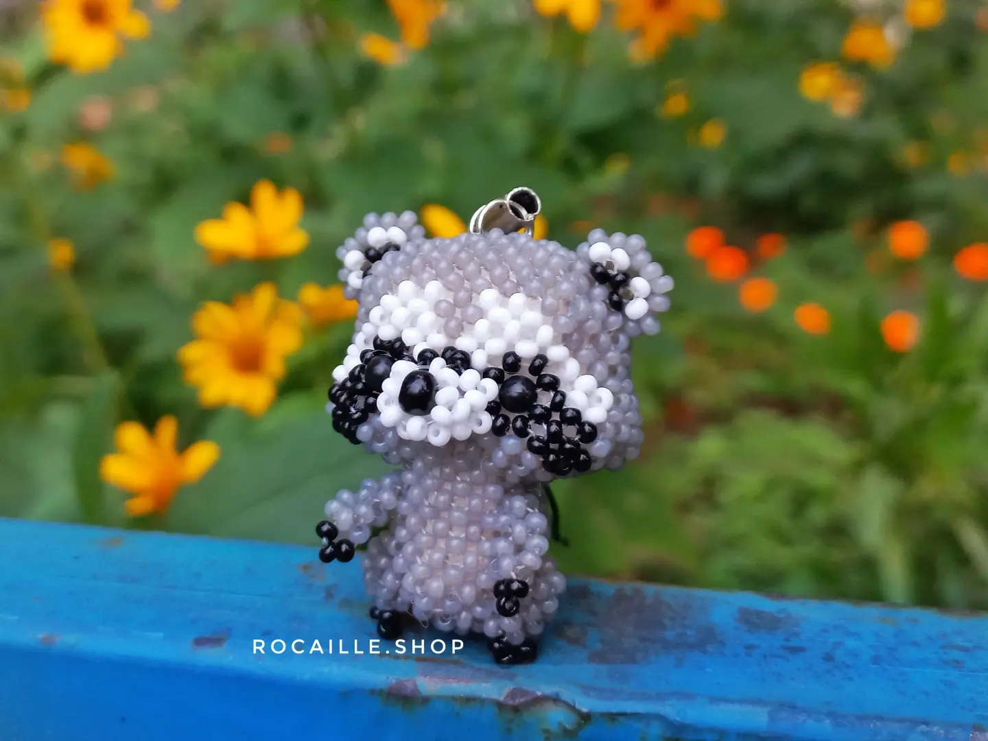 Racoon made of beads front view